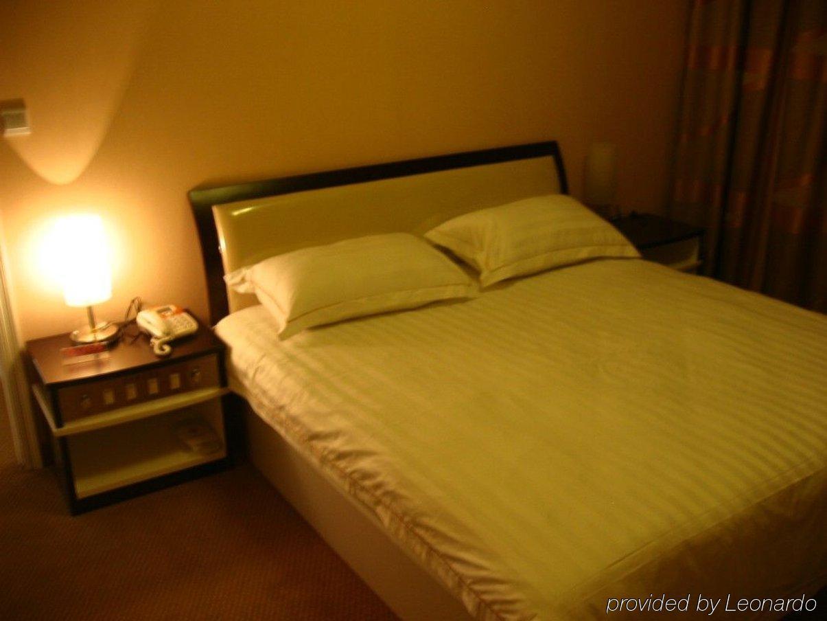 Jiujiu Holiday Hotel Xangai Quarto foto