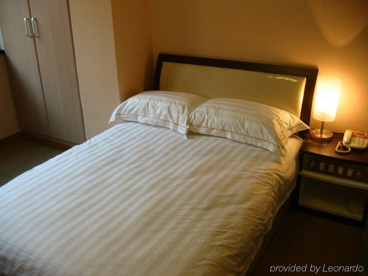 Jiujiu Holiday Hotel Xangai Quarto foto