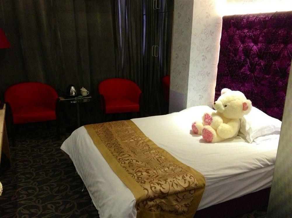 Jiujiu Holiday Hotel Xangai Exterior foto