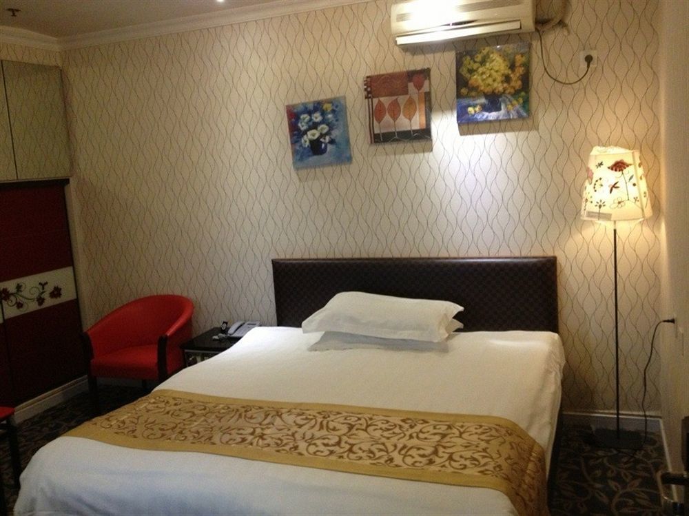 Jiujiu Holiday Hotel Xangai Exterior foto