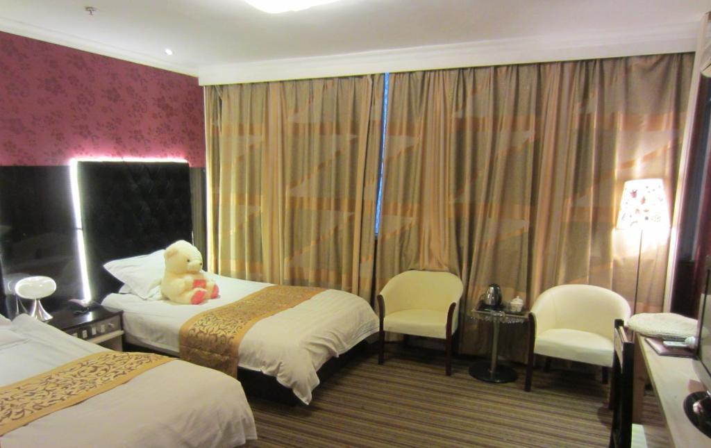 Jiujiu Holiday Hotel Xangai Quarto foto