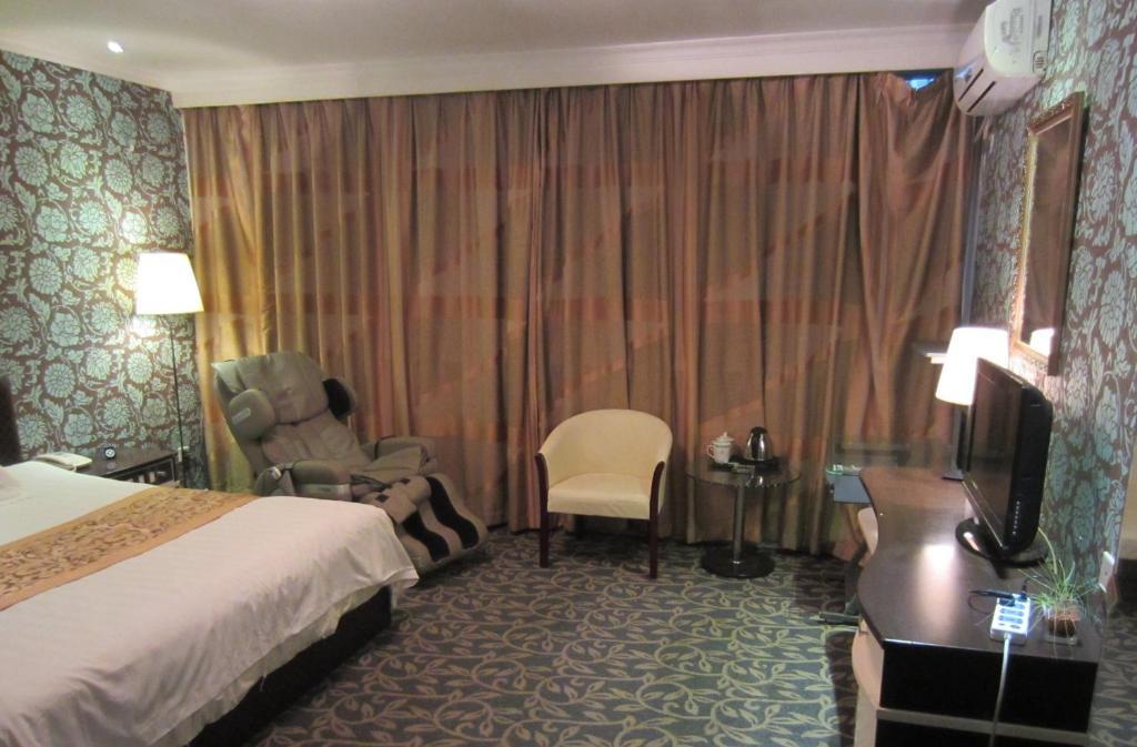 Jiujiu Holiday Hotel Xangai Quarto foto